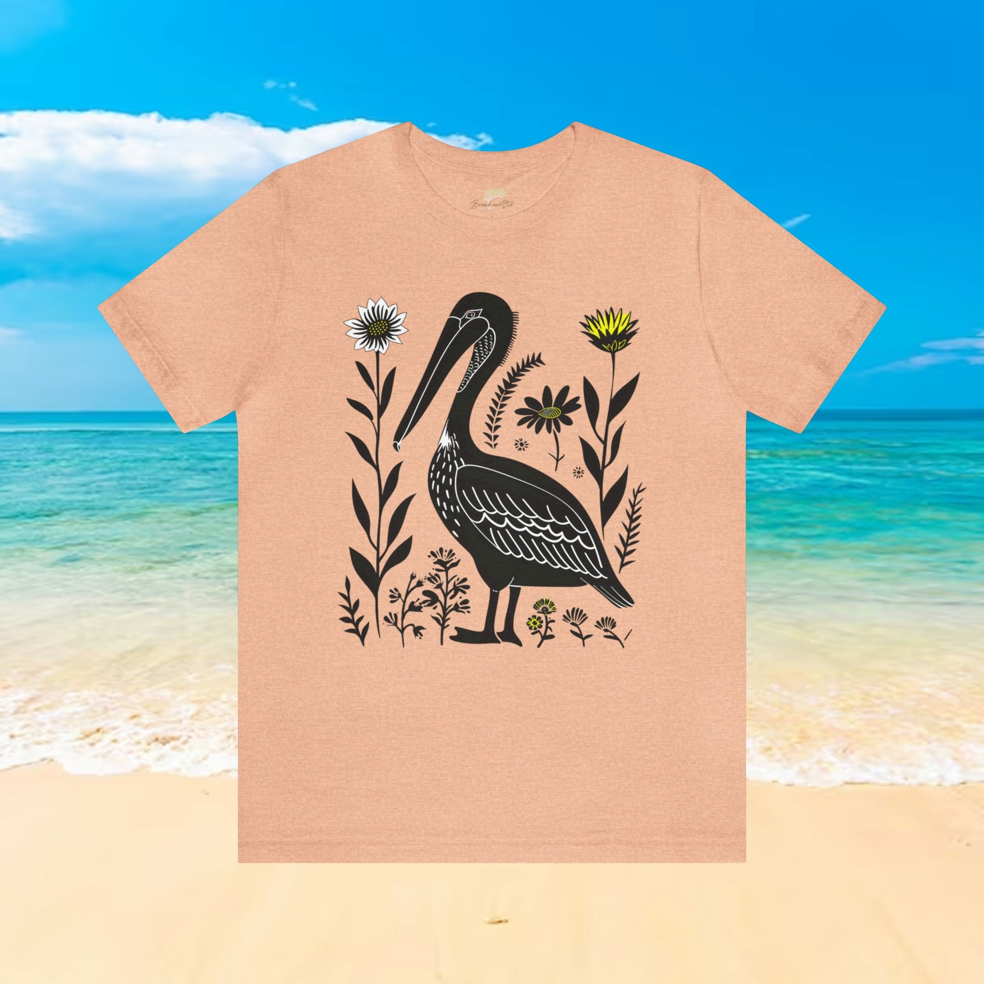 Pelican with Wildflower Animal Design Unisex Tee | Expertly Crafted Branch and Stick