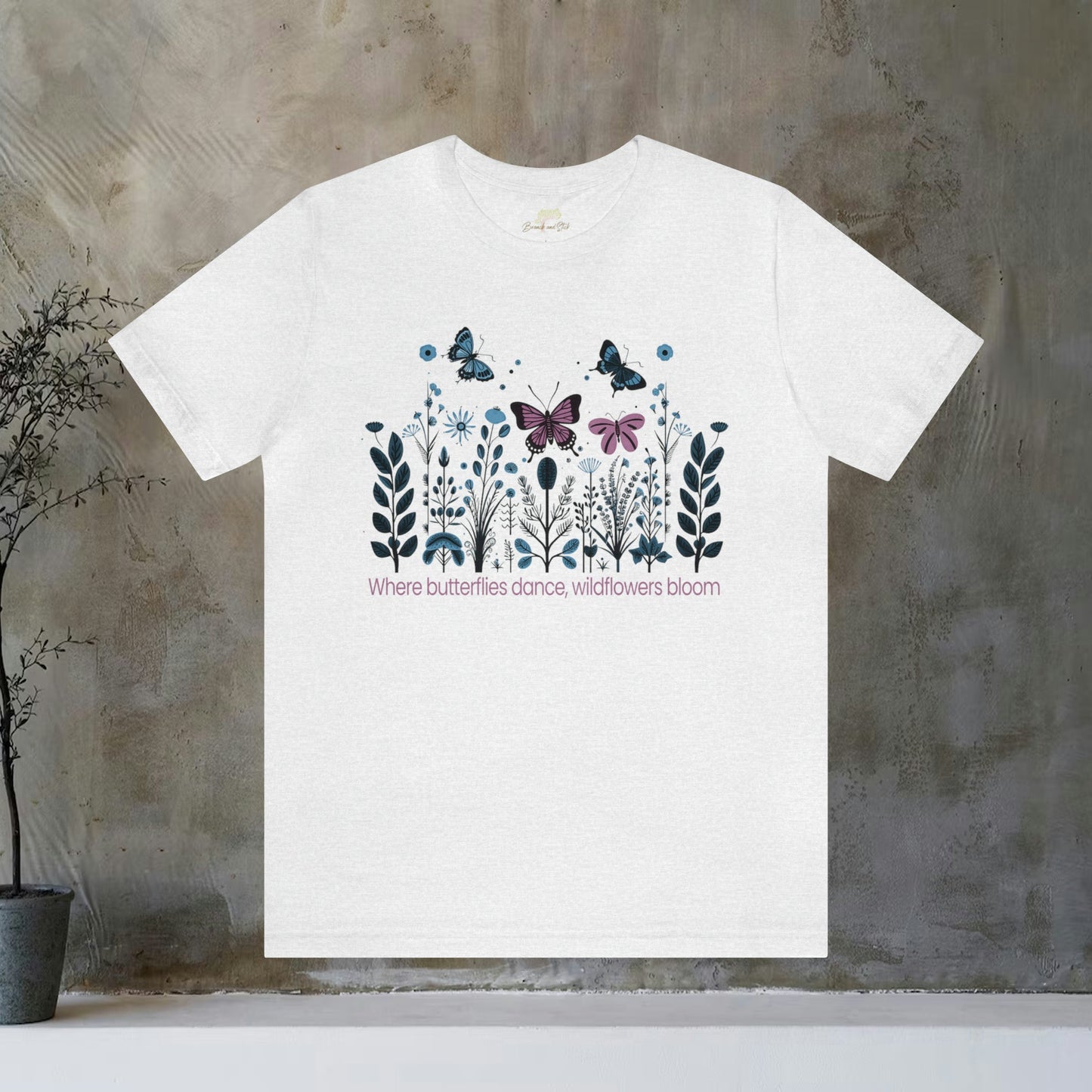 Where Butterflies Dance, Wildflowers Grow Folk Art Design Unisex Tee | Embrace Nature's Elegance Branch and Stick